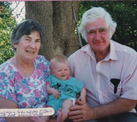 Clare & Jack holding Gabby